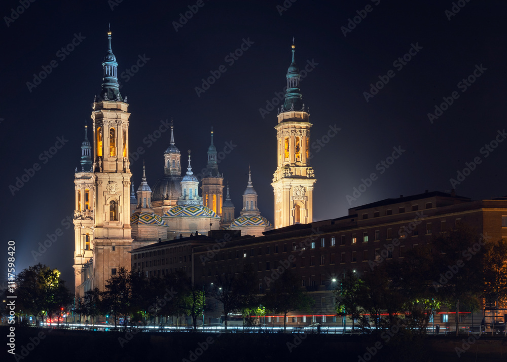 Naklejka premium Illuminated Basilica of Our Lady of the Pillar at Night in Zaragoza