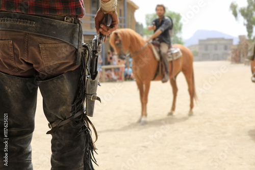 almería poblado del oeste vaquero sacando la pistolapa en un duelo con un vaquero a caballo escenario de peliculas de vaqueros western 4M0A6451-as24 photo