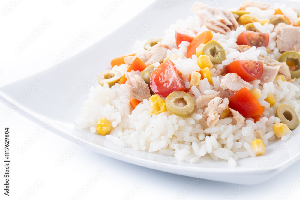 Rice salad with tomato, corn,olives and tuna isolated on white background Rice salad with tomato, corn,olives and tuna isolated on white background