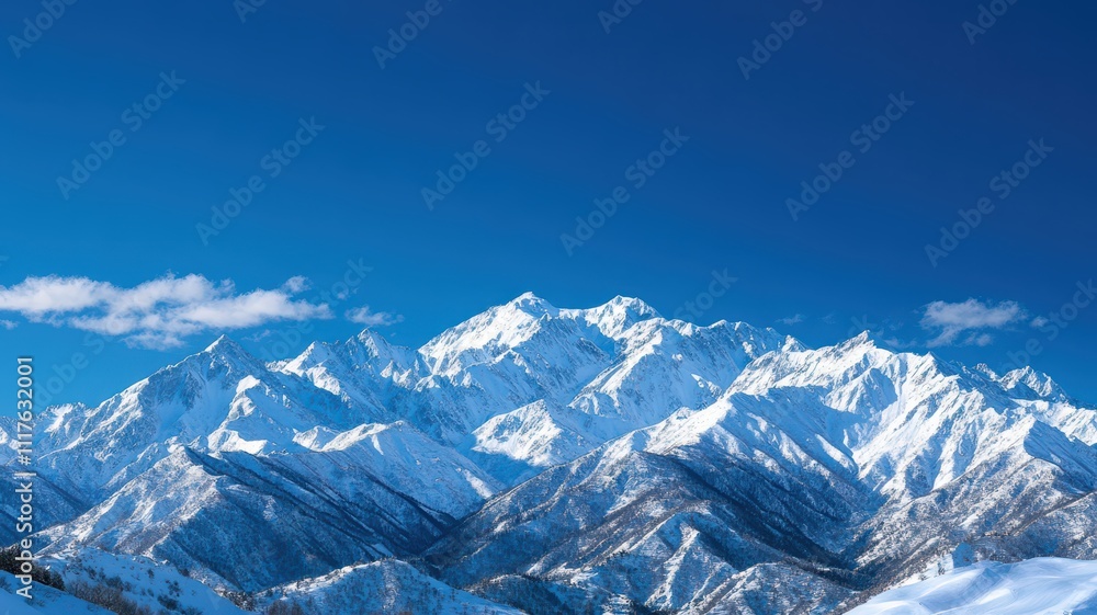 Snow-capped mountains under a clear blue sky, showcasing breathtaking natural beauty and majestic peaks. Snow-capped mountains under a clear blue sky, showcasing breathtaking natural beauty and majestic peaks.
