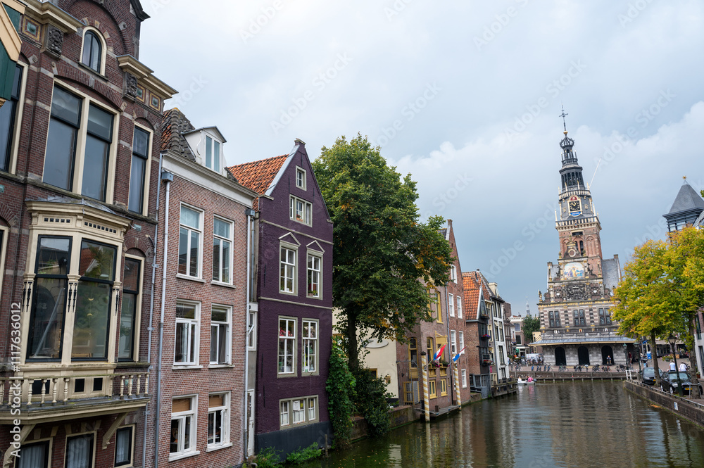 Alkmaar, Netherlands, - View of the city with the water canal and the weighing house Alkmaar, Netherlands, - View of the city with the water canal and the weighing house