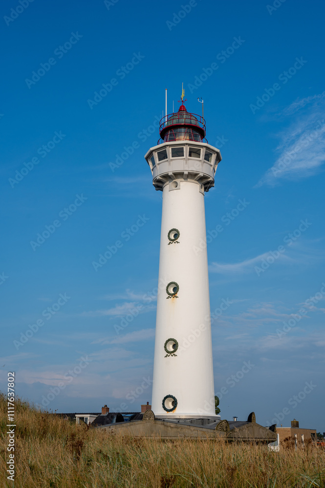 Lighthouse in the dunes of the Dutch town of Egmond aan Zee Lighthouse in the dunes of the Dutch town of Egmond aan Zee