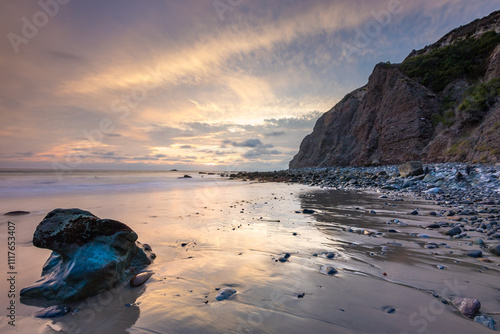 Obraz na płótnie Sunset over the tranquil Dana Cove shoreline w salonie
