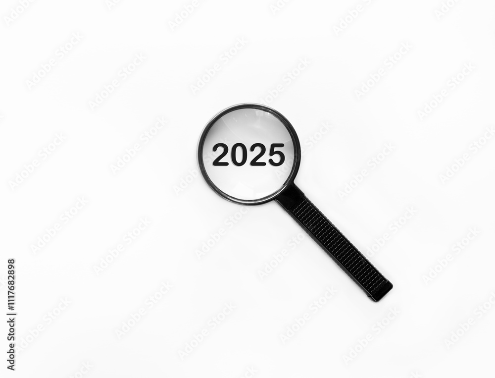 Magnifying glass focusing on year 2025 for new business linked to happy new year and merry Christmas concept Magnifying glass focusing on year 2025 for new business linked to happy new year and merry Christmas concept