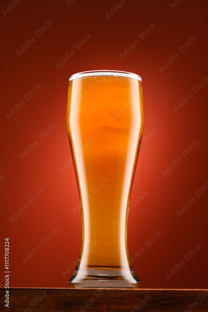 glass of beer, on wooden stand, with red background, object close-up, beer bubbles and foam glass of beer, on wooden stand, with red background, object close-up, beer bubbles and foam