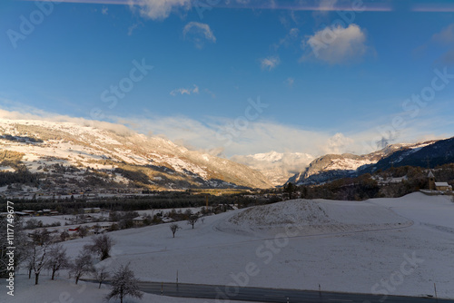 Scenic view of snowy landscape at Hinterrhein Valley in the Swiss Alps on sunny autumn day. Photo taken November 22nd, 2024, Sils im Domleschg, Switzerland. photo