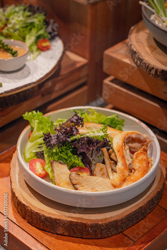 Obraz na plátne High angle, Grilled mushroom and chicken breast salad with caesar sauce on bowl,