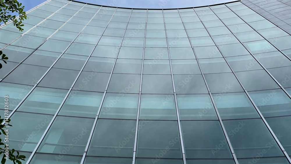 A glass facade of the office building design A glass facade of the office building design