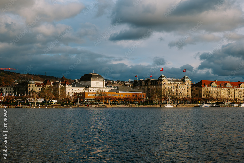 Fototapeta premium Zurich opera house as seen from a lakeside pier. Sunny, overcast winter day
