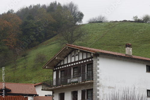 Basque style house in the village of Lesaka, Spain photo