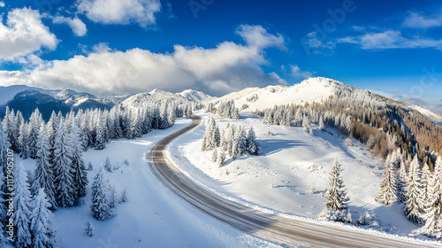 Snowy mountain road in winter landscape. photo