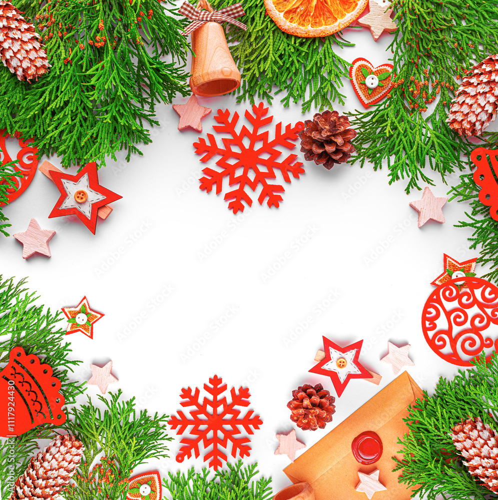 Christmas background. Christmas eve concept. Top view of gift boxes, fir branches, toys, on white background.