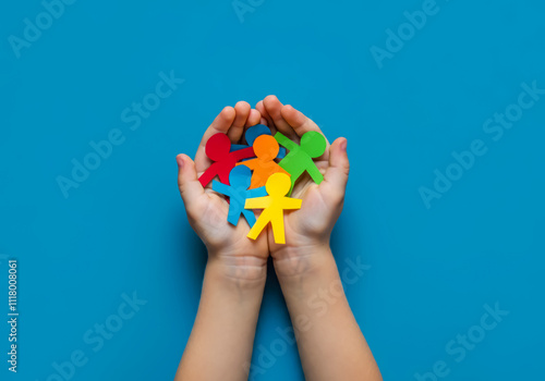 Wallpaper Mural Little Hands Protecting Paper People Highlighting Family Unity, Promoting Social Equality, and Supporting Vulnerable Children Torontodigital.ca
