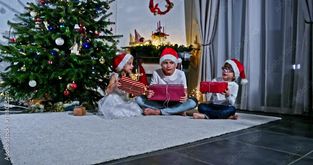 Children gather around, sharing gifts in a festive setting Children gather around, sharing gifts in a festive setting