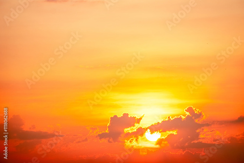 Sky,sunset, beautiful , luxury soft gradient orange gold clouds and sunlight on the blue sky perfect for the background, Sunrise on morning or everning in winter warm time ,Twilight summer,silhouette photo