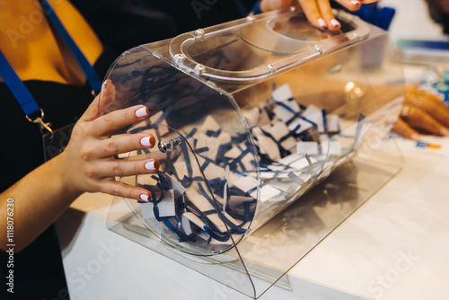 Schilderij op canvas Process of prize drawings, extracting a winning numbers of lottery machine, raff