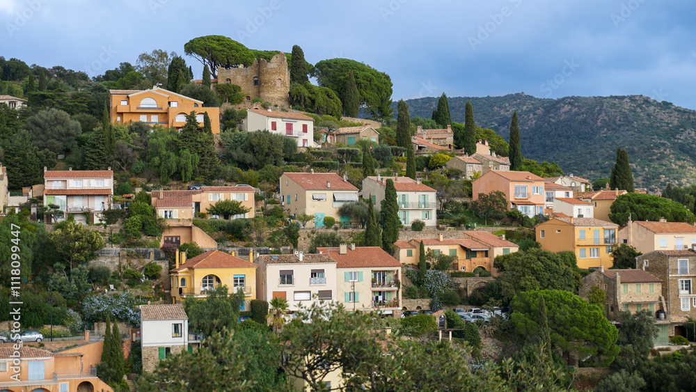 Panoramic view of houses and roofs of medieval village of Bormes-les-Mimosas, in the Var, in Provence, France Panoramic view of houses and roofs of medieval village of Bormes-les-Mimosas, in the Var, in Provence, France
