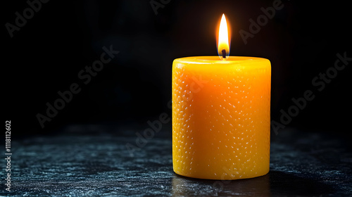 Plain dark background with a single illuminated candle symbolizing hope and epiphany with copy space concept as A plain dark background featuring a single illuminated candle symbolizing hope and epiph photo