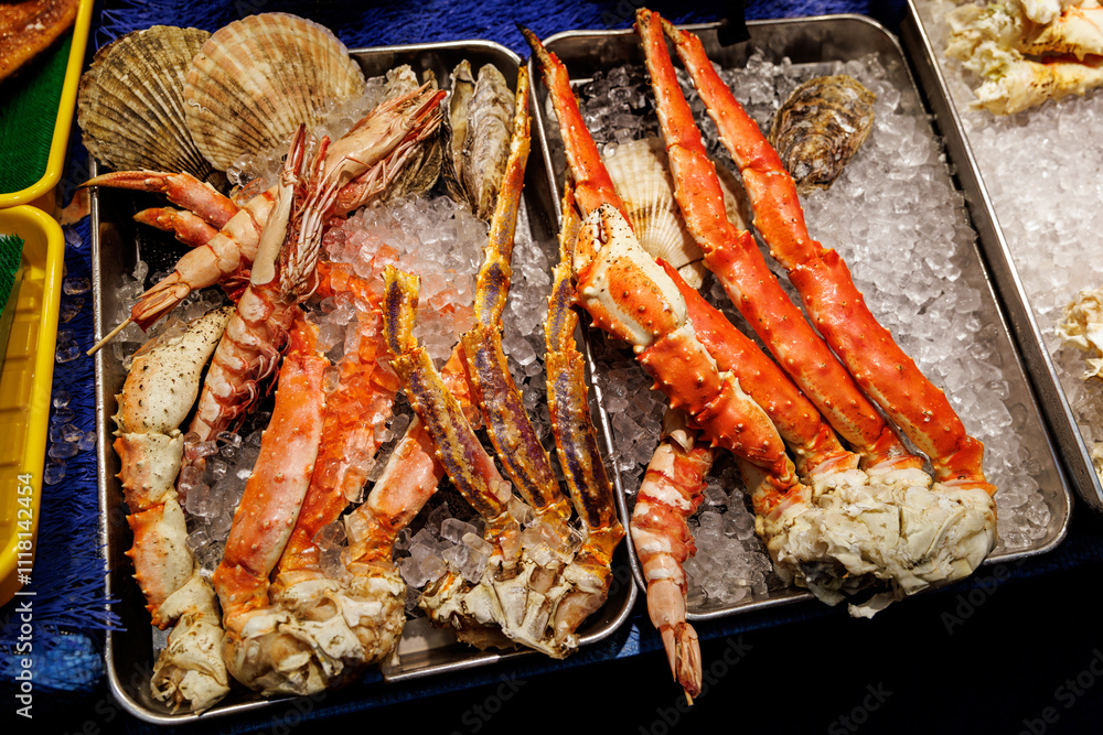 A Beautiful Fresh Seafood Display Featuring an Array of Crabs and Shellfish on Ice A Beautiful Fresh Seafood Display Featuring an Array of Crabs and Shellfish on Ice