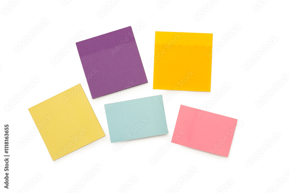 Blank colored sticky papers on a white background with copy space Blank colored sticky papers on a white background with copy space