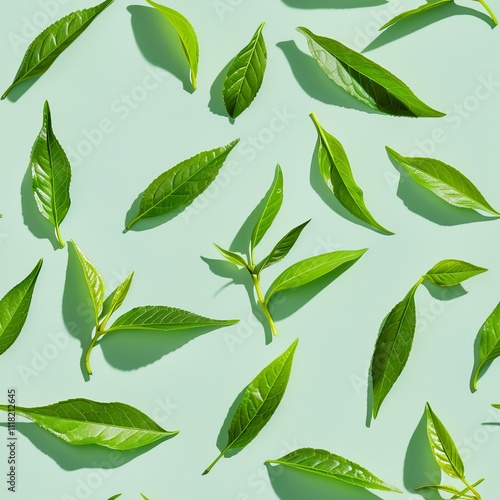 Seamless Pattern of Vibrant Green Tea Leaves Arranged on a Delicate Pastel Green Background