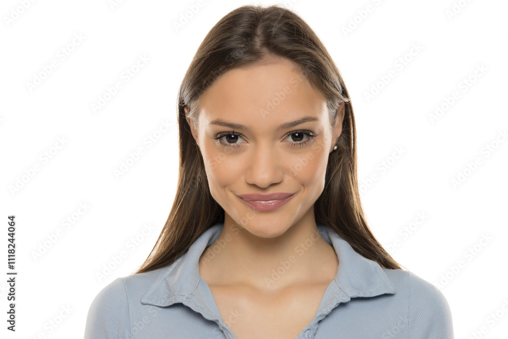 Portrait of a beautiful young smiling woman with makeup on a white studio background Portrait of a beautiful young smiling woman with makeup on a white studio background
