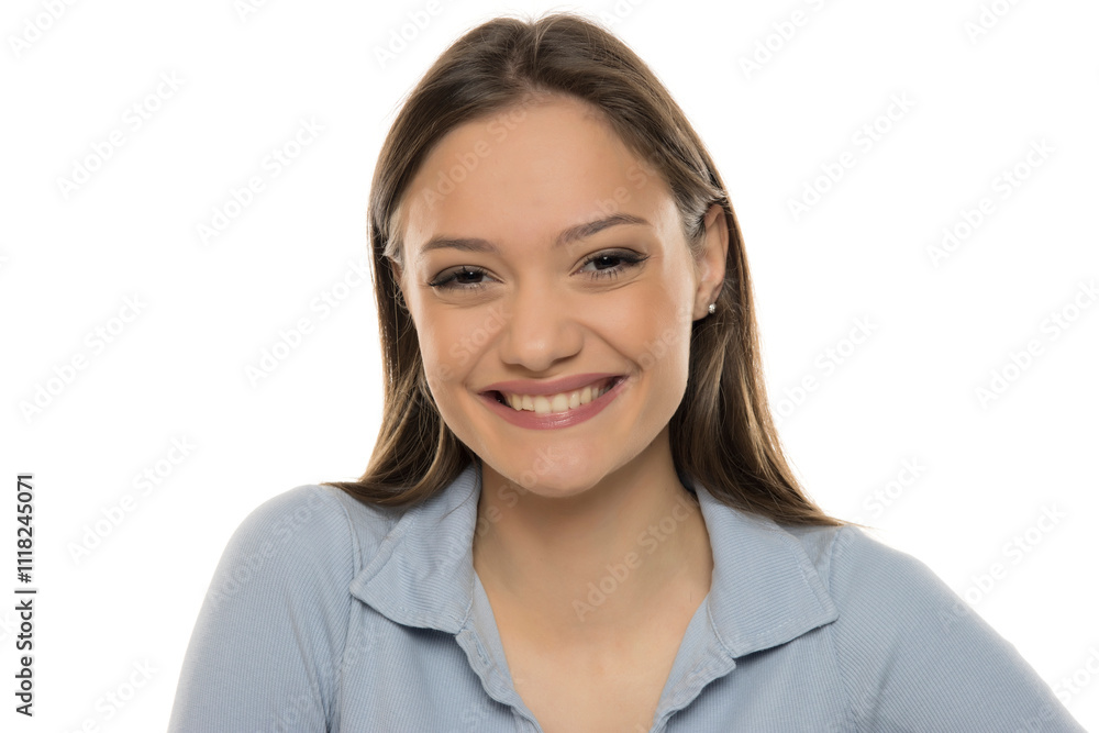 Portrait of a beautiful young happy woman with makeup on a white studio background Portrait of a beautiful young happy woman with makeup on a white studio background