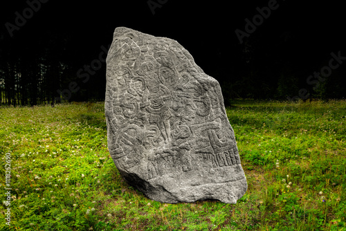 фотографія Jelling stone, replica of Harald Bluetooth's rune stone from Jelling, massive ca