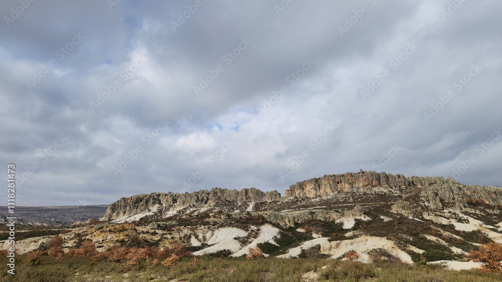 Rocky hills in the north of the Kirkinler Byzantine Rock Monastery in Iscehisar district of Afyonkarahisar province in the western Anatolia in Turkey. Rocky hills in the north of the Kirkinler Byzantine Rock Monastery in Iscehisar district of Afyonkarahisar province in the western Anatolia in Turkey.