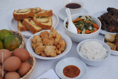 traditional Indonesian food arranged neatly on a white surface