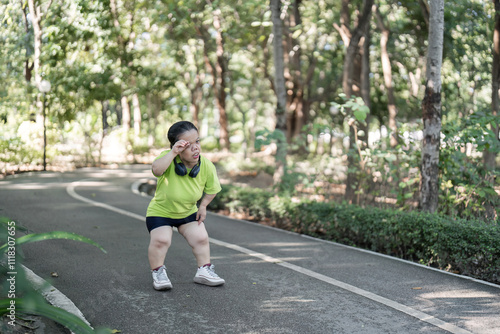 Empowered Young Woman with Disability Jogging in Park for Fitness and Wellbeing