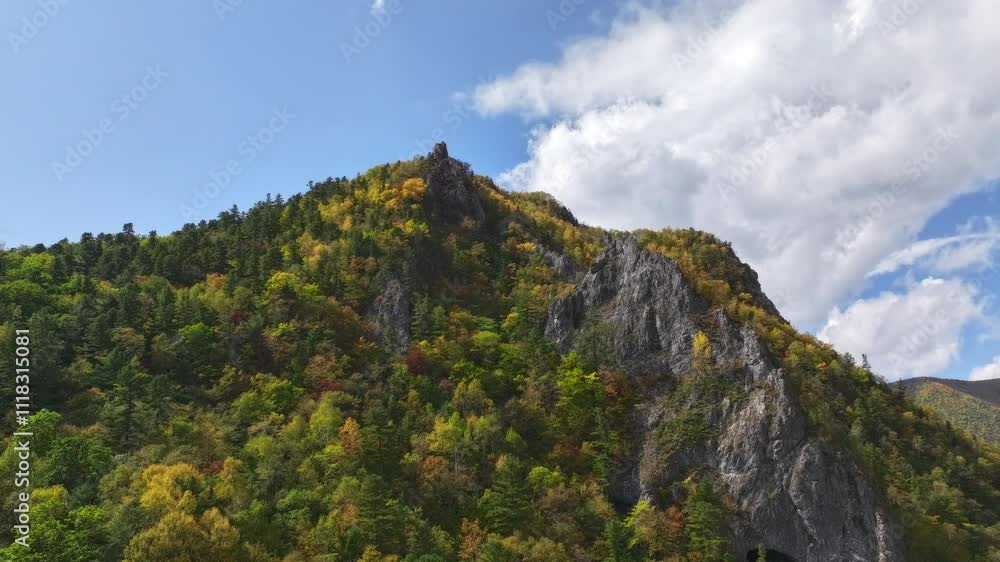 Clouds passing over colorful mountain peak timelapse Clouds passing over colorful mountain peak timelapse