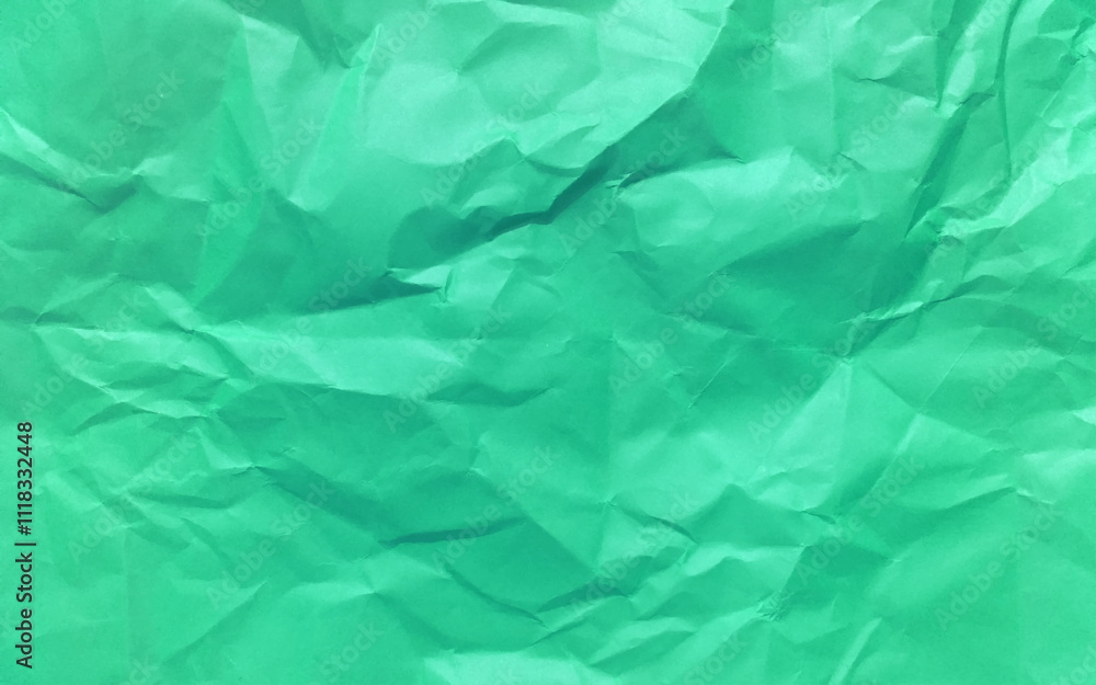 Obraz premium Illustration abstract green color crumpled paper texture background vector. Crumpled paper texture abstract background.