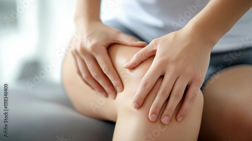 Wallpaper Mural Physical therapist in scrubs works with patient lying down during therapy at  clinic,copy space Torontodigital.ca