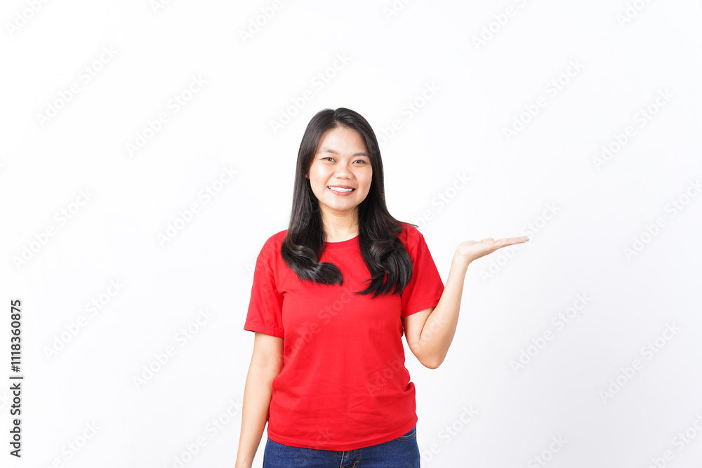 Showing and presenting product for ad on open hand palm Of Beautiful Asian Woman Wearing red shirt Isolated On White Background Showing and presenting product for ad on open hand palm Of Beautiful Asian Woman Wearing red shirt Isolated On White Background