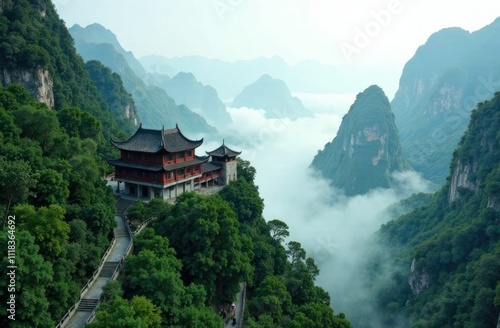 Wallpaper Mural Mystical mountain pagoda surrounded by clouds and lush green valleys Torontodigital.ca