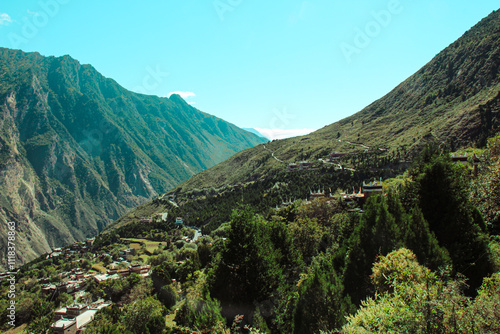 Sichuan, China Jiaju Tibetan Village, Danba, concentrated place for Jiarong Tibetans with hundreds of Tibetan-style houses built along the mountains fertile fields, picturesque landscapes