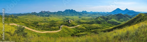 Breathtaking panoramic view of green hills and distant mountains.