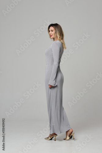 Fashion shooting in studio . Professional model , fashionable clothes and style, new collection. stylish look