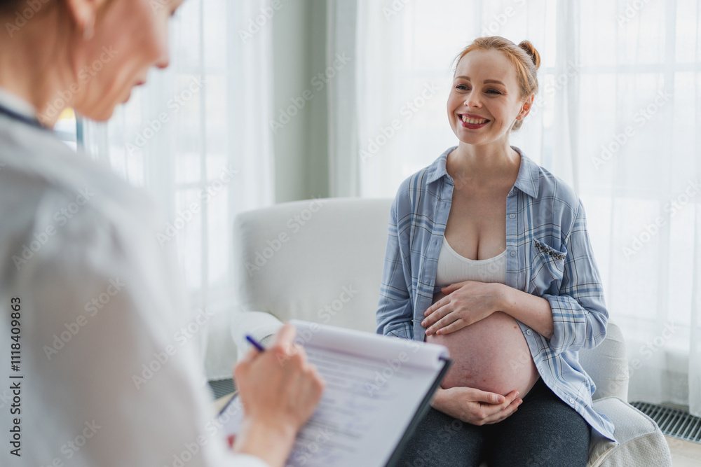 Female doctor examining pregnant woman in doctor office. Pregnant girl patient have consultation in hospital. Gynecologist doctor consulting patient about pregnancy. Visit to doctor medical checkup Female doctor examining pregnant woman in doctor office. Pregnant girl patient have consultation in hospital. Gynecologist doctor consulting patient about pregnancy. Visit to doctor medical checkup