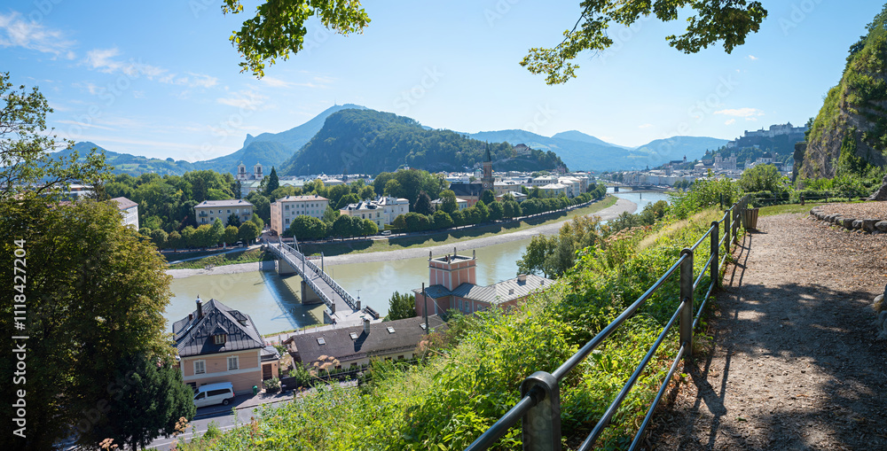 Fototapeta premium Viewpoint on the Monchsberg with a view of the Hohensalzburg Fortress and the Salzach river