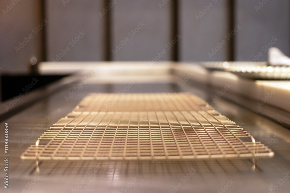Fototapeta premium Empty baking rack on kitchen countertop.
