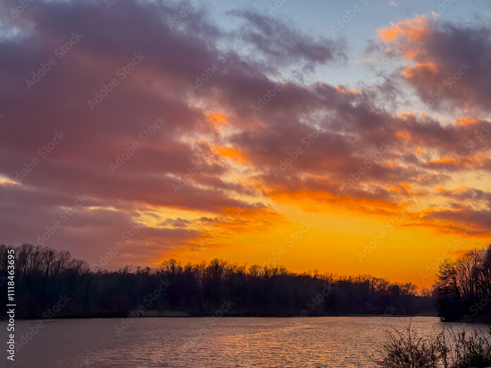 Country Lake Reflecting Sunset Colors In The Water Country Lake Reflecting Sunset Colors In The Water