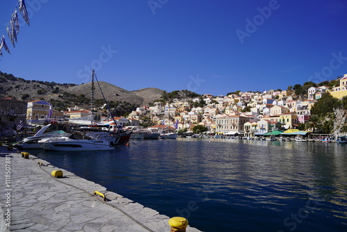 boats in the picturesque and beautiful waters of Symi island marina photo