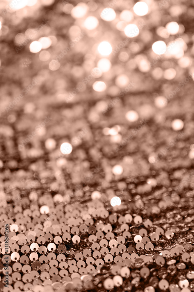 Beautiful Christmas light background. Abstract bokeh and scattered sequins in gold color of the year 2025 mocha mousse Beautiful Christmas light background. Abstract bokeh and scattered sequins in gold color of the year 2025 mocha mousse