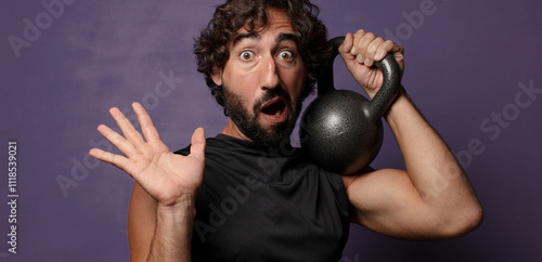 Wallpaper Mural young bearded crazy fitness man sport concept Torontodigital.ca