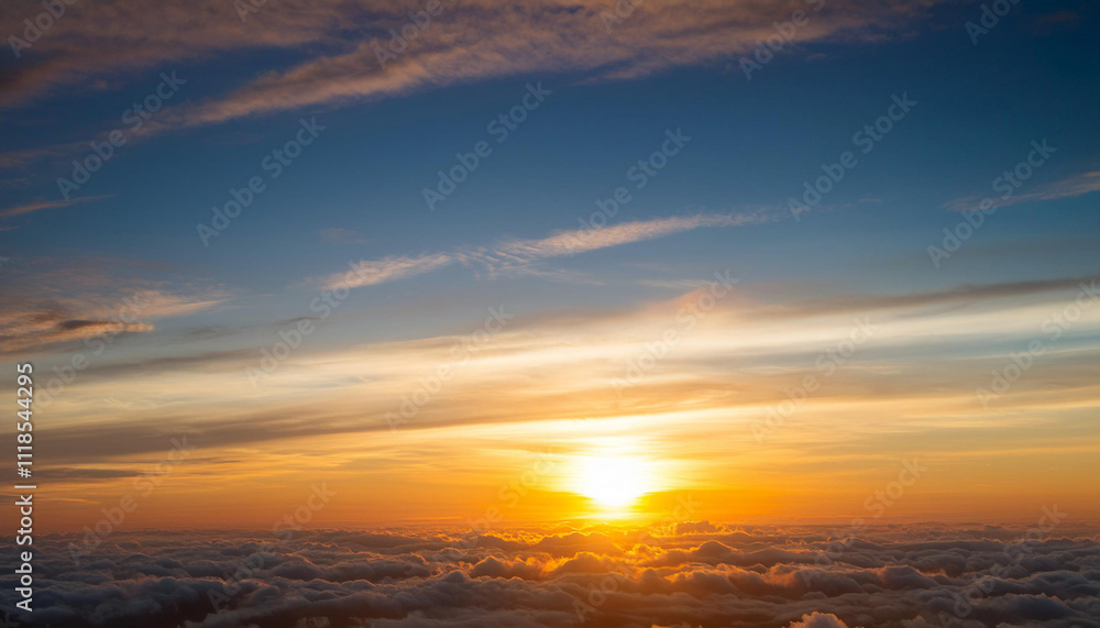 Sun Setting Over Clouds in Sky and Copy Space Sun Setting Over Clouds in Sky and Copy Space