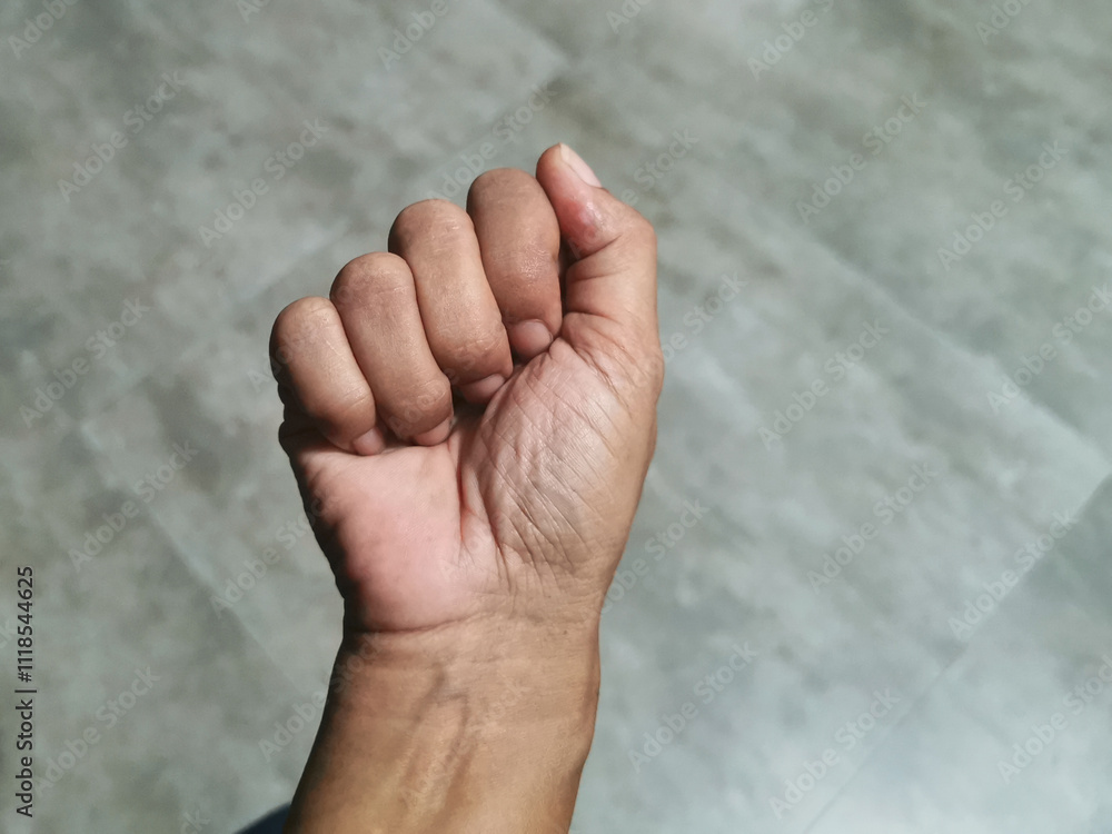 Clenched hands, a symbol of enthusiasm. The American Sign Language, ASL, Alphabet to represent the letter 'A'. Clenched hands, a symbol of enthusiasm. The American Sign Language, ASL, Alphabet to represent the letter 'A'.
