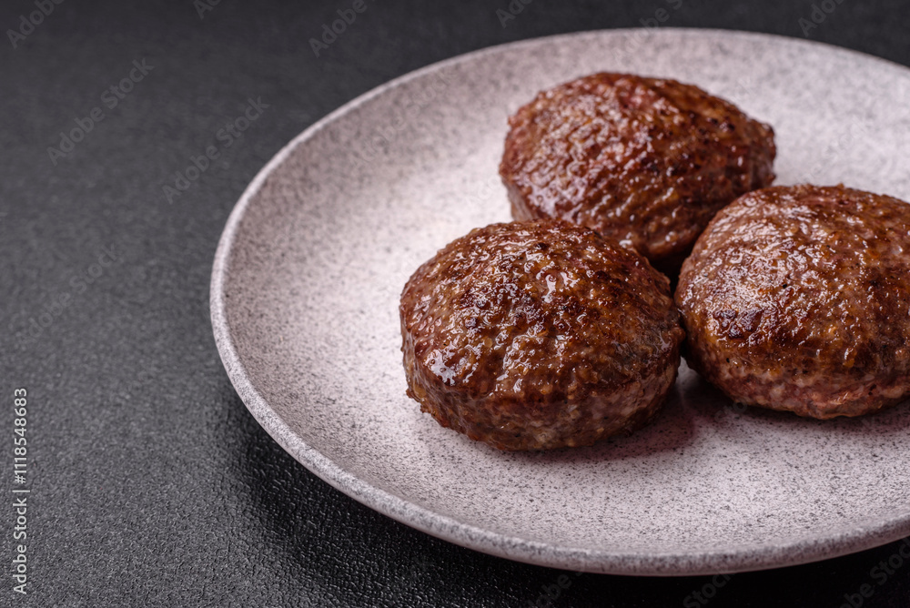Beef burger patties with salt, spices and herbs Beef burger patties with salt, spices and herbs
