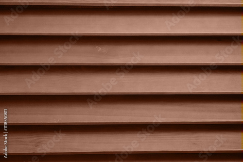 Color of the year 2025 Mocha Mousse. Old grunge dark textured wooden background with holes. The surface of the brown texture of wooden blinds. High quality photo photo